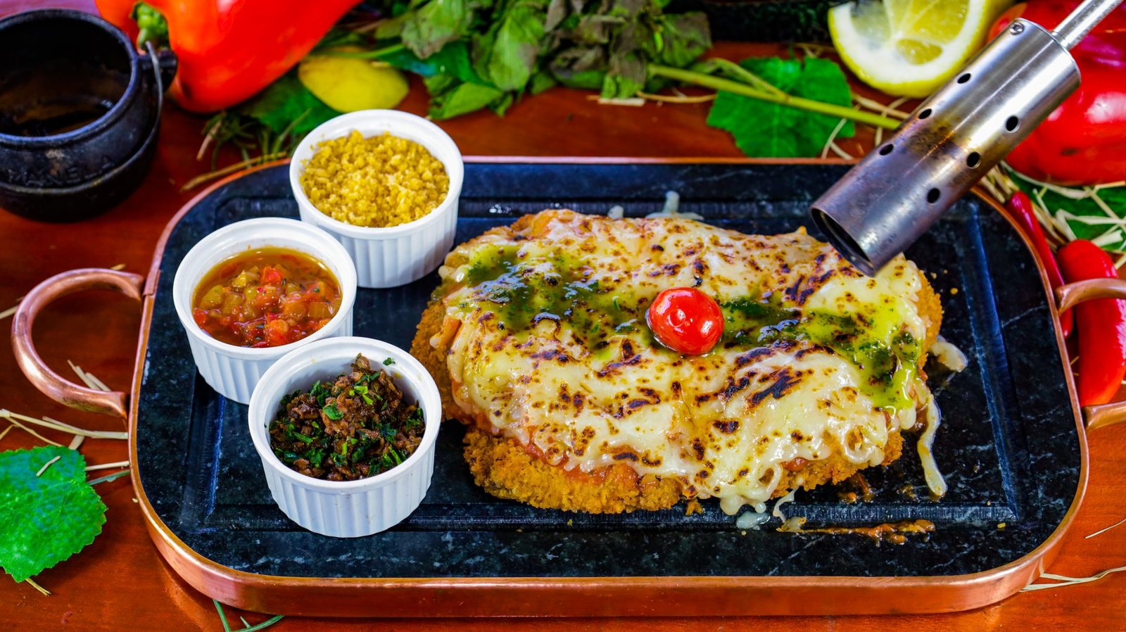 Parmegiana de filé- Acompanha porção de arroz